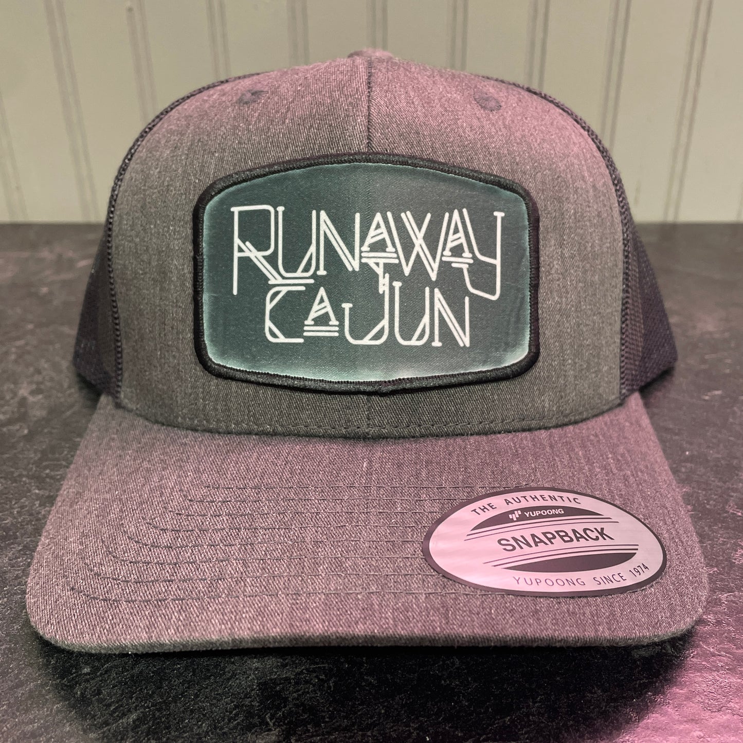 Runaway Cajun Cryptid Trucker Cap